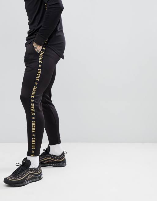 https://images.asos-media.com/products/siksilk-cropped-jogger-in-black-with-gold-side-stripe/10102339-1-black?$n_640w$&wid=513&fit=constrain