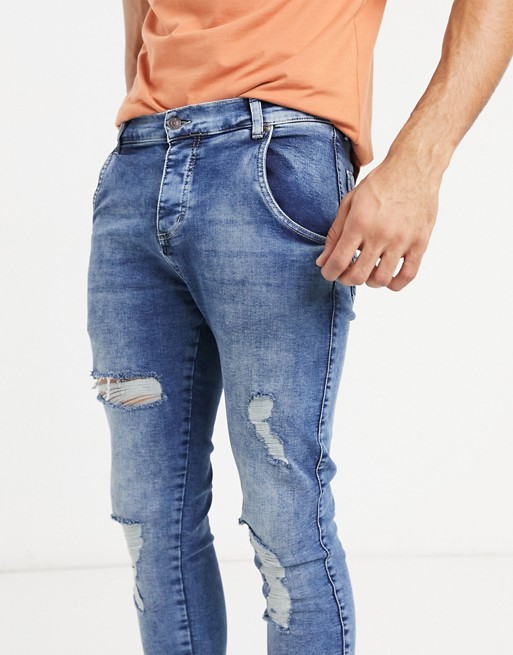 SikSilk distressed skinny jeans in midwash