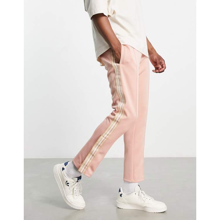 Pink joggers with white stripe hot sale