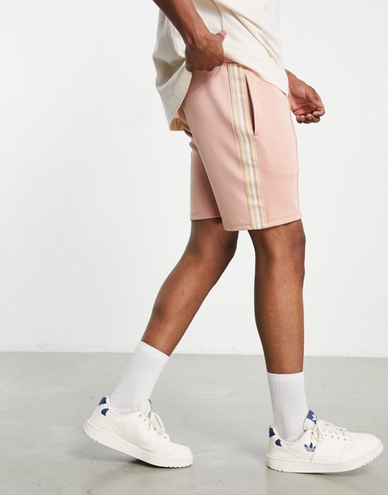 https://images.asos-media.com/products/siksilk-infinite-pleated-shorts-in-pale-pink-with-side-stripe/202119075-2?$n_550w$&wid=550&fit=constrain