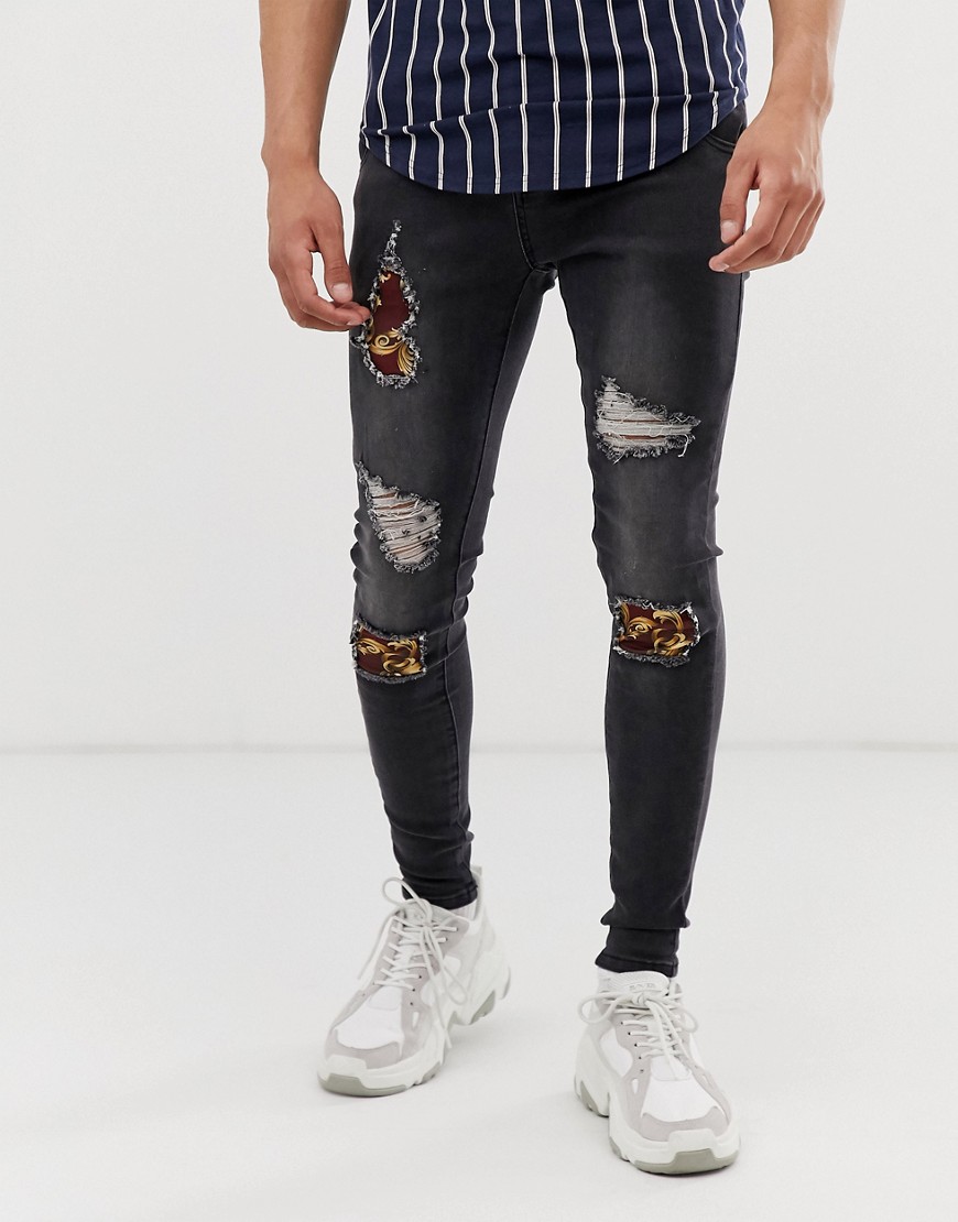 SikSilk - Jeans super skinny con nero slavato con strappi stile barocco