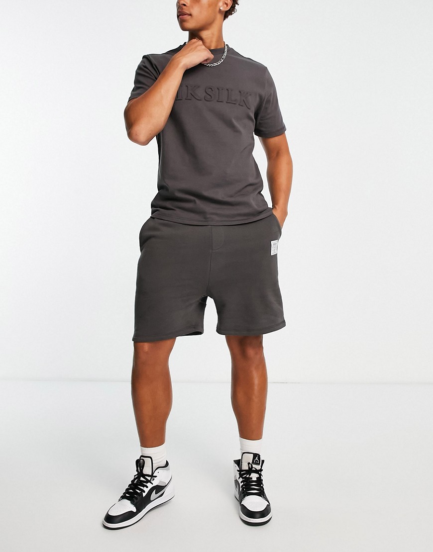 oversized jersey shorts in washed black - part of a set