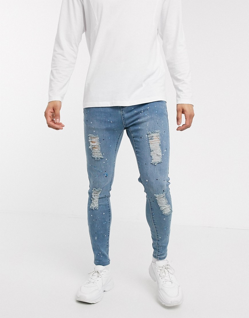 SikSilk - Riot - Jeans skinny con stampa di macchie e strappi blu stone wash