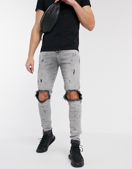 SikSilk skinny jeans with paint splat and knee rips in grey