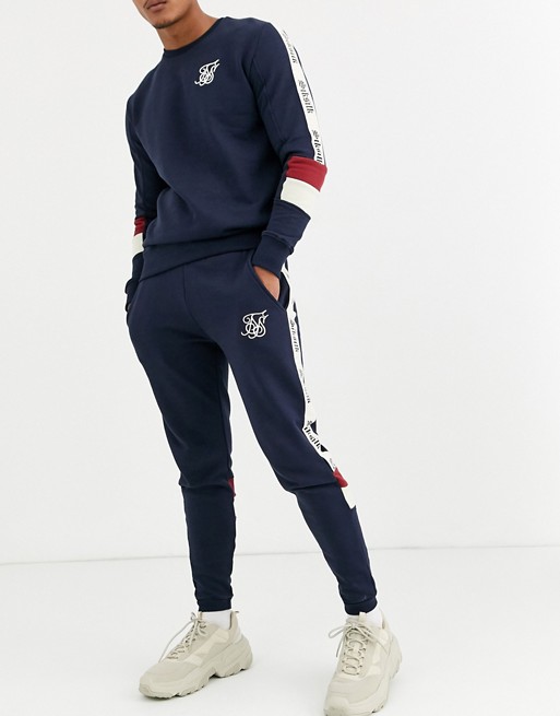 SikSilk skinny joggers in navy with taping