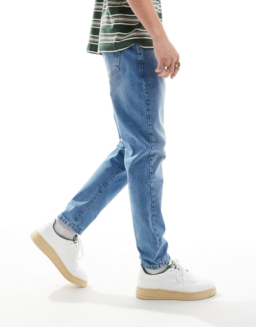 straight leg denim jeans in midwash blue