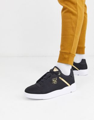 SikSilk – Svarta sneakers med gulddetalj och logga