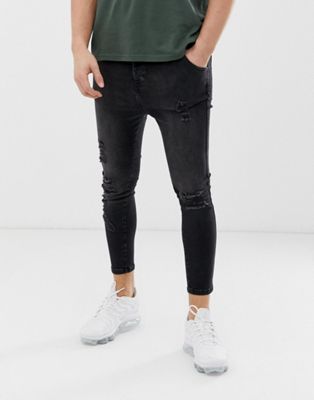 SikSilk – Svarta superskinny jeans med revor på knäna