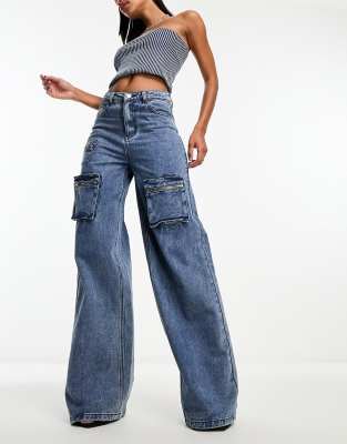 SIMMI - Jeans mit weitem Bein und Taschendetail in verwaschenem Blau