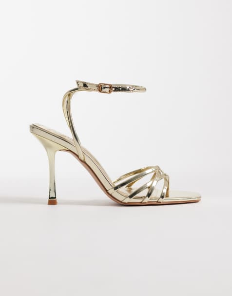 SIMMI London – Amby – Guldfärgade, spegelblanka klacksandaler med smala remmar - view 1