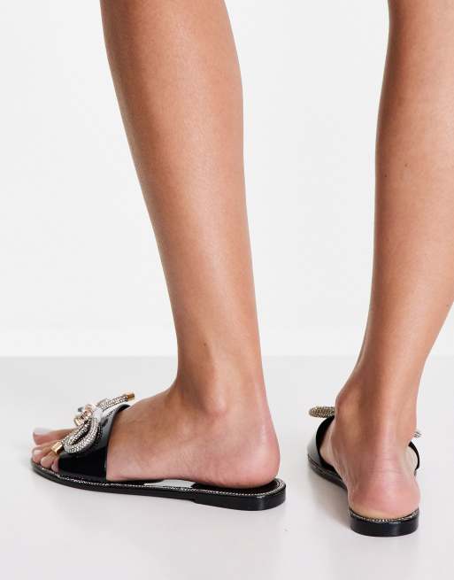 SIMMI London Annabella bow embellished jelly sliders in black ASOS
