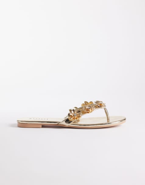 Simmi London Carissa flip flops with appliqués in gold - view 1