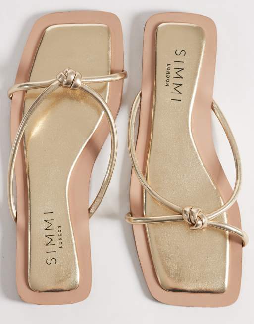 SIMMI London – Cola – Guldfärgade, platta sandaler med knutar och bred passform, 4 av 4