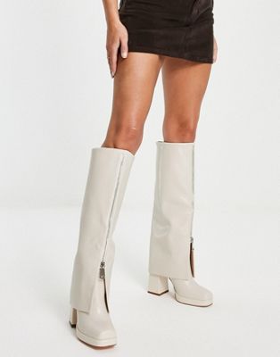 Simmi London Dixee zip through foldover boots in white | ASOS
