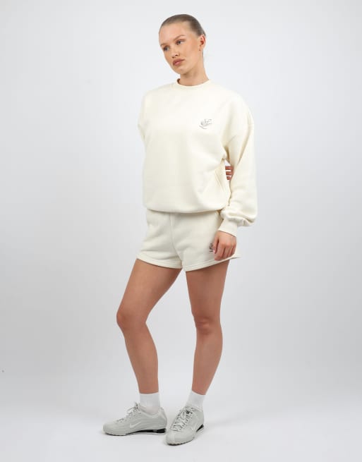 Simmi London Embroidered logo jersey shorts in cream, 4 of 4