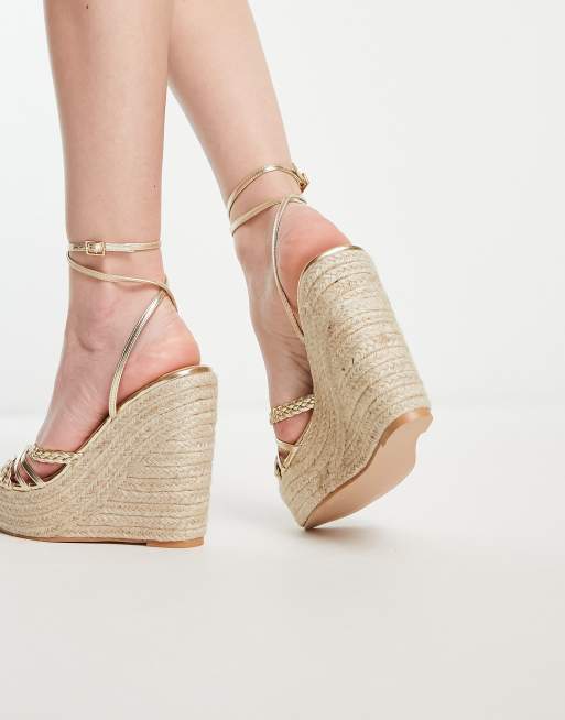 Sandali color oro con zeppa top