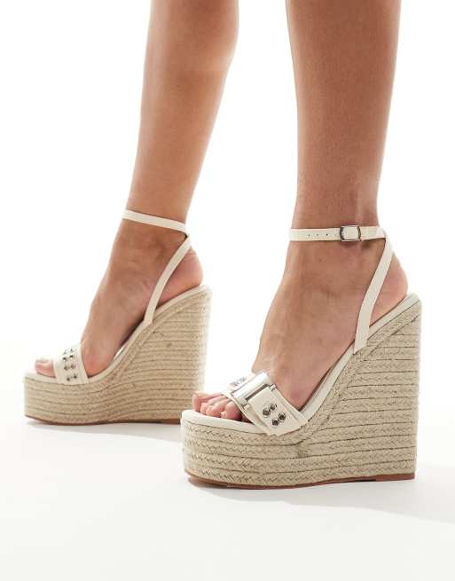 Simmi London - Jamaica - Espadrilles met hoge sleehak en gesp met oogjes in crème 