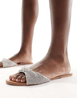 Simmi London - Kenya - Flache Sandalen in Silber mit verziertem Riemen