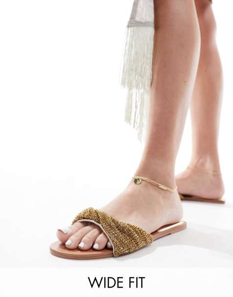 Simmi London - Kenya - Platte sandalen met brede pasvorm en versierd bandje in goud - view 1