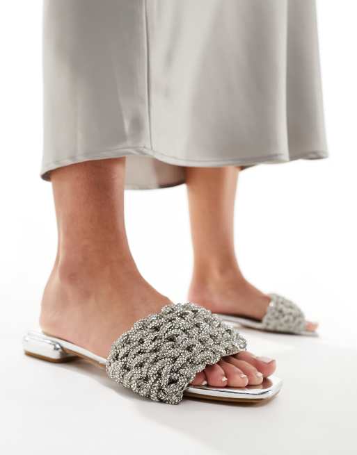 Simmi London – Pariis – Silvermetalliska utsmyckade sandaler i slip on-modell