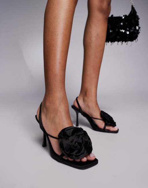 SIMMI London - Quarts - Sandalen met hak en rozet in zwart