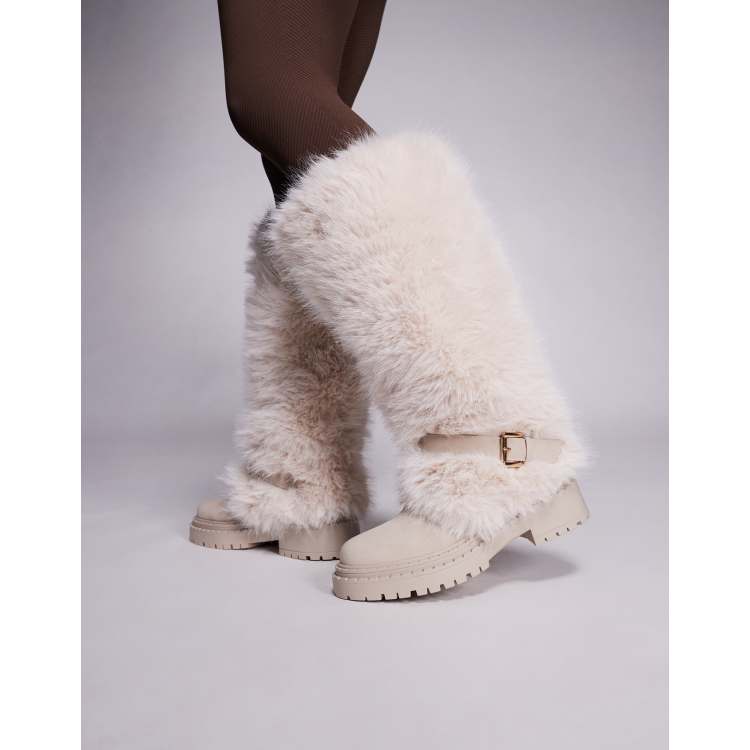 Simmi London Reginald faux fur knee boots with buckles in cream | ASOS
