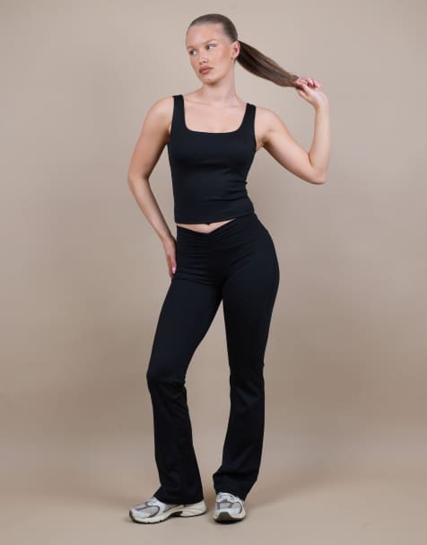 Simmi London Ruched front flared leggings in black - view 1