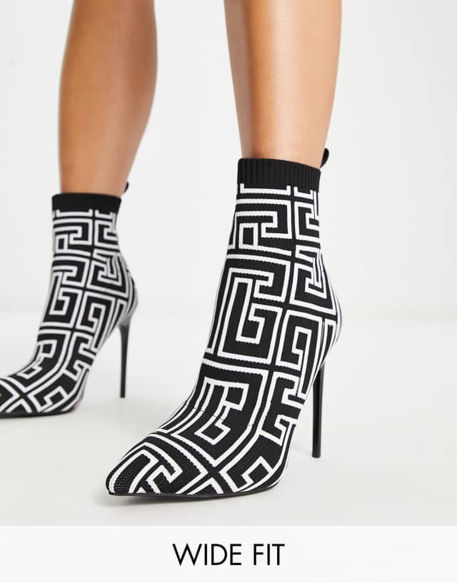 Simmi London Wide Fit Anusha stiletto heel sock boots in mono print