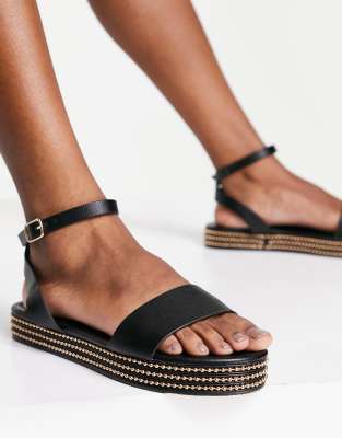 black studded flatforms