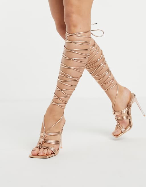 Thigh high sale strappy heels