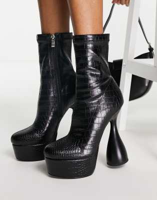 black vinyl platform boots