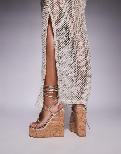 Simmi London Wide Fit Jadey strappy high heel wedges in gold