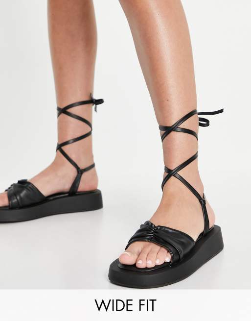 Simmi London Wide Fit Naeva ankle tie flatform sandals in black | ASOS