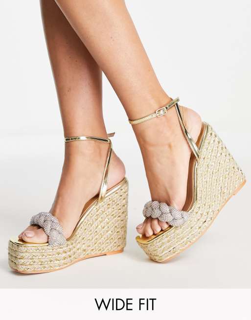 Simmi London Wide Fit – Sandały espadryle na koturnie z ozdobnym plecionym paskiem w kolorze złotym  