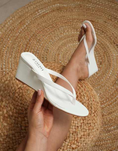 SIMMI Shoes Immy toe post wedge sandals in white - view 1