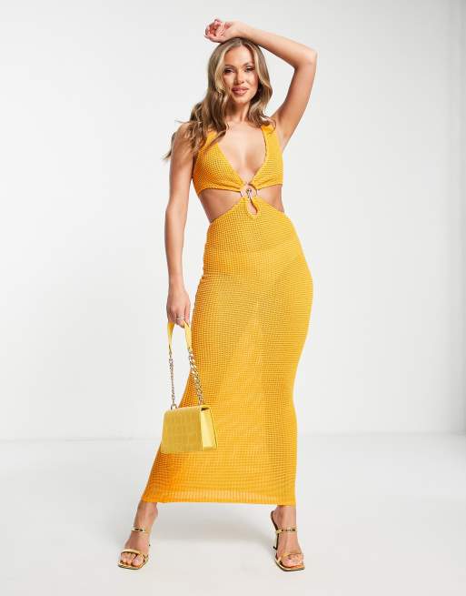 Simmi - Vestito lungo arancione con cut-out in vita e dettaglio in metallo