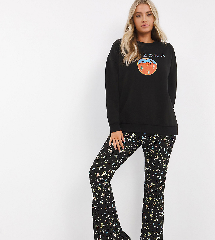 Simply Be flared pants in black ditsy floral print