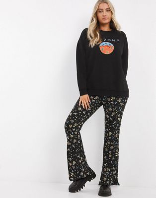 Simply Be flared trousers in black ditsy floral print
