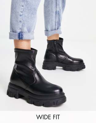 Wide Fit pull on flat ankle boots with cleated sole in black