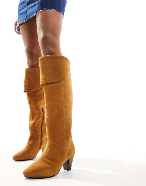 Tan coloured knee high 2024 boots