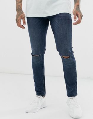 фото Сине-черные зауженные джинсы с прорехами на коленях asos design-синий