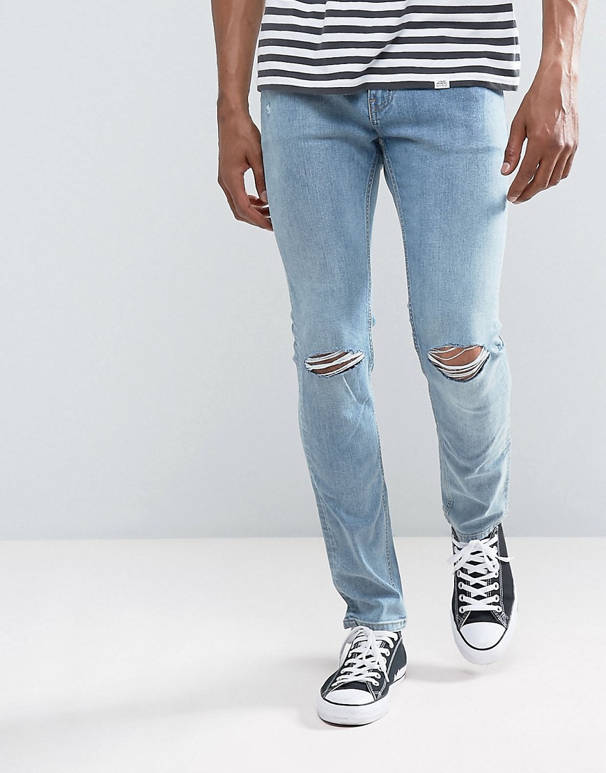 фото Синие облегающие джинсы с рваными коленями cheap monday-синий