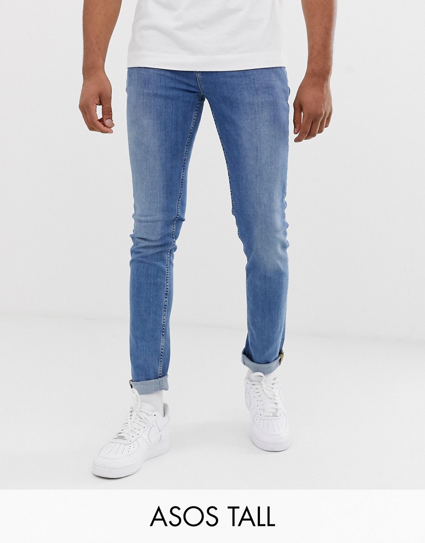 фото Синие выбеленные облегающие джинсы asos design tall-синий