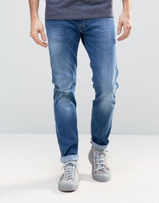 фото Синие выбеленные узкие джинсы replay-синий
