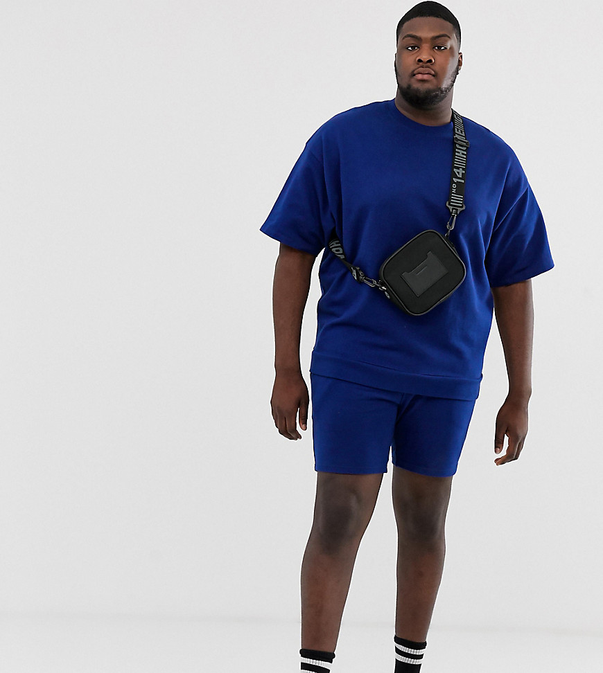 фото Синий oversize-свитшот с короткими рукавами и шорты скинни asos design plus-темно-синий