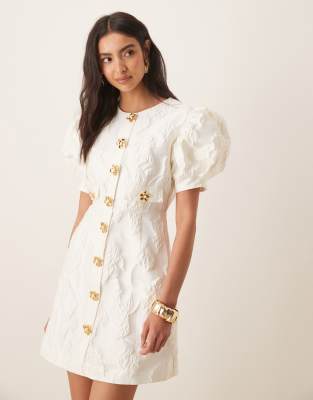 Sister Jane Anemone Jaquard Puff Sleeve Gold Flower Button Up Mini Dress In Neutral