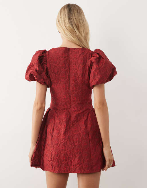 red mini dress with black tights Red flared dress, black tights and elegant necklace