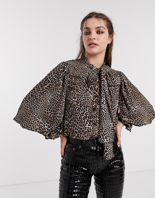 Sister Jane blouse with cameo brooch and volume sleeves in leopard print
