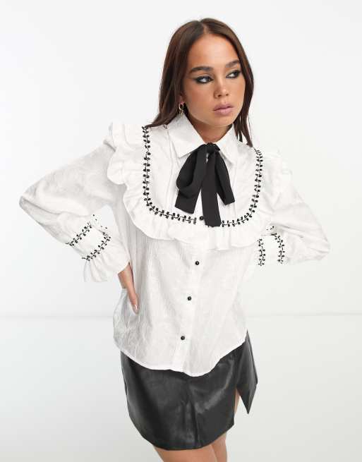 Sister Jane - Blusa bianca con volant, fiocco e cuciture a contrasto