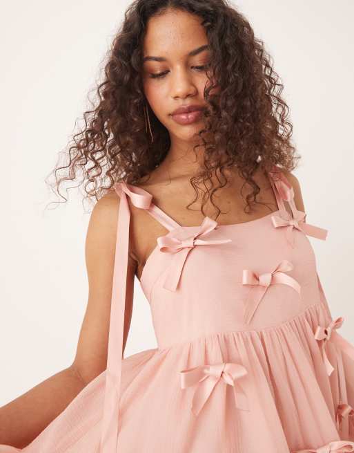 Sister Jane bow embellished midi dress in baby pink | ASOS